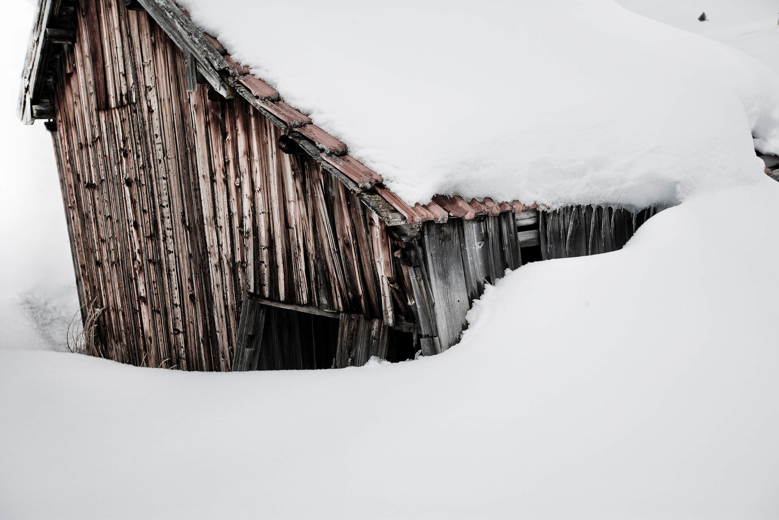 Snowbound shepherd huts, Dolomites