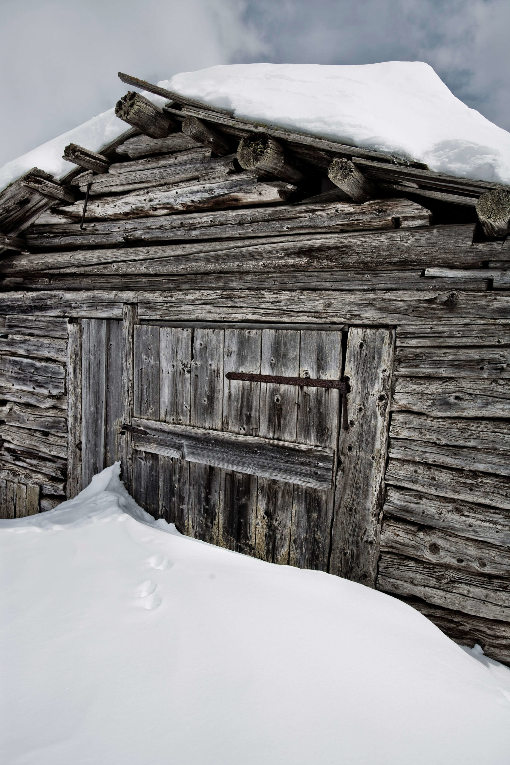 Snowbound shepherd huts, Dolomites