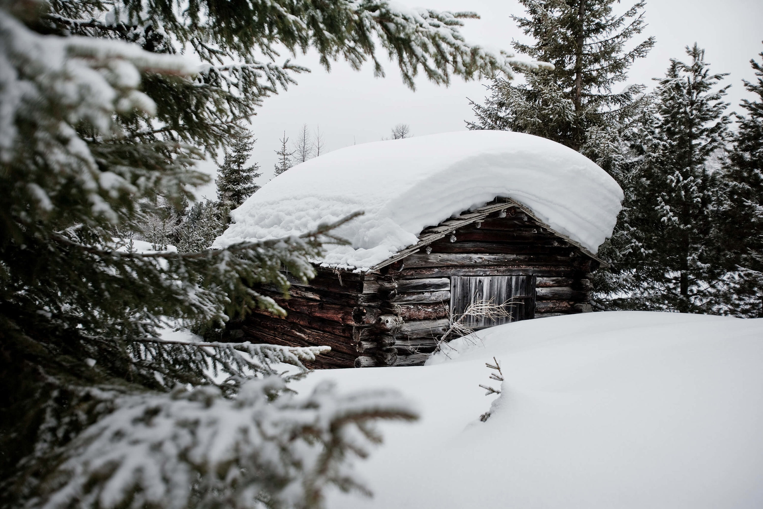 Snowbound shepherd huts, Dolomites